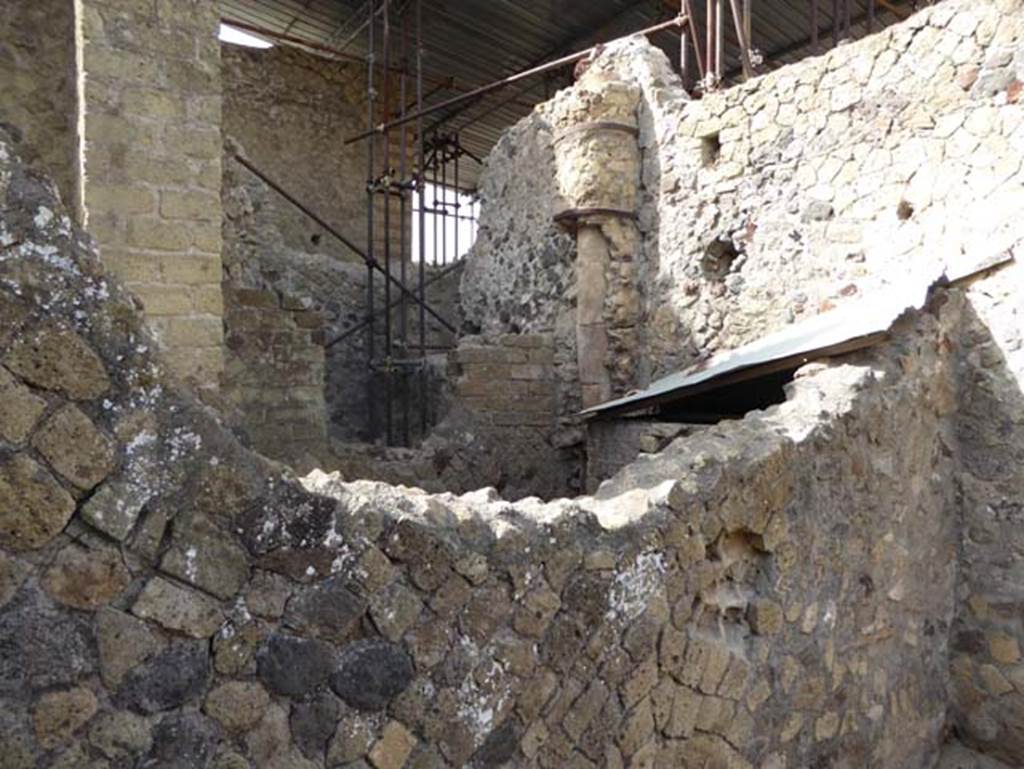 IV.19 Herculaneum. October 2014. Looking south-east towards part of the rear rooms, from south wall of triclinium 16, in IV.4. Photo courtesy of Michael Binns.